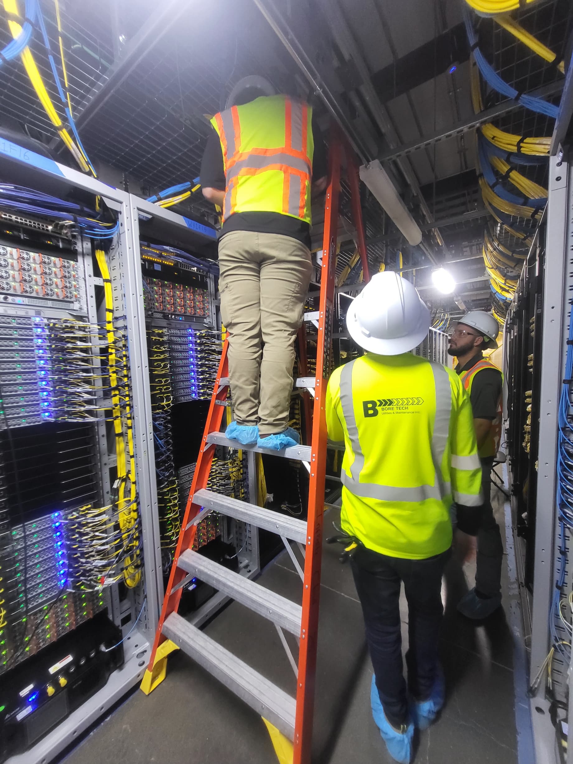 Bore Tech technician working inside a data center